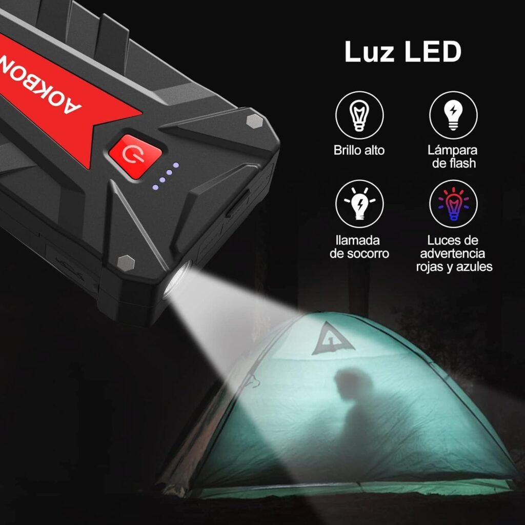 Arrancador AOKBON 1200A iluminando con linterna LED, ideal para emergencias nocturnas y situaciones de poca visibilidad.